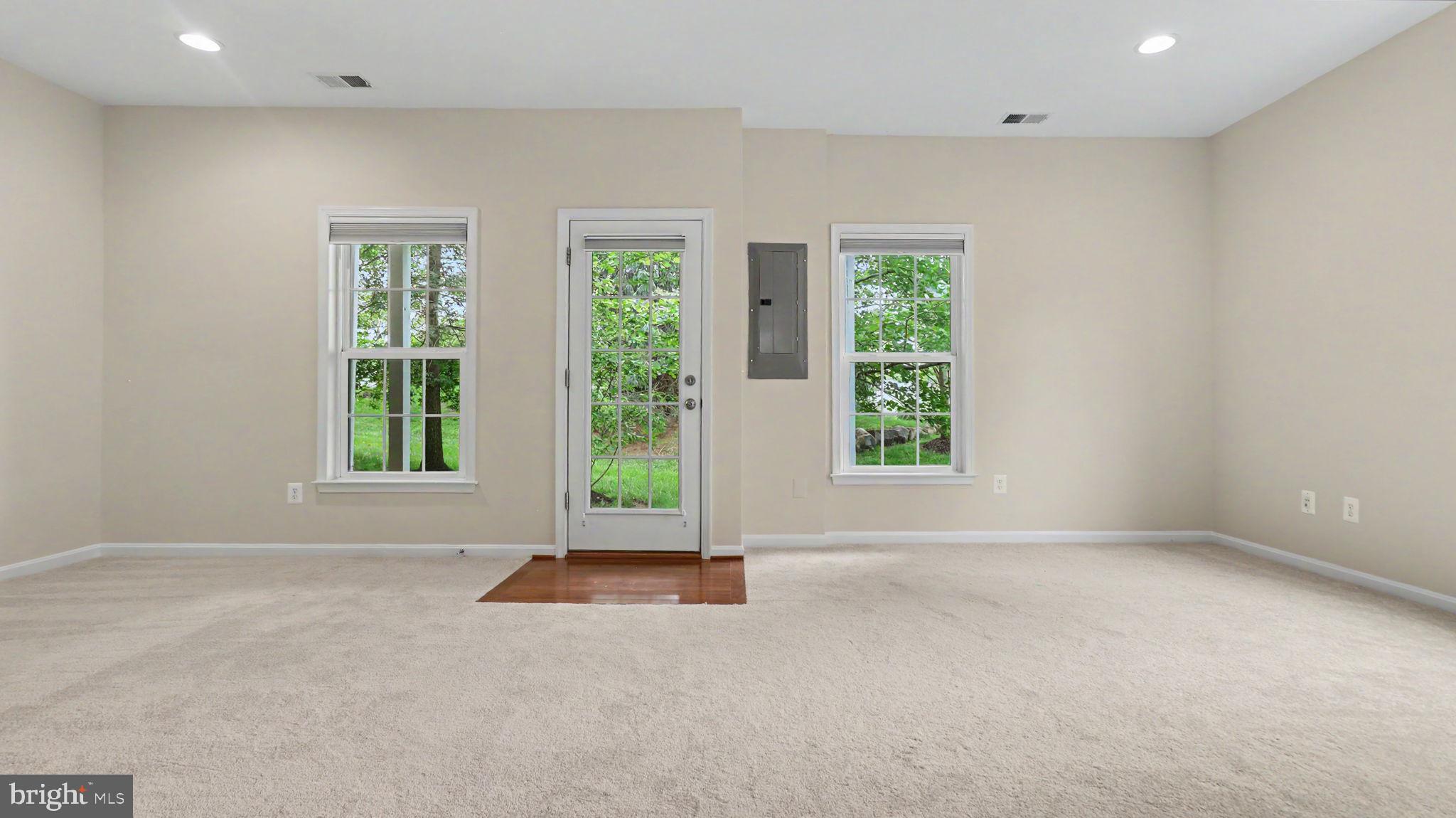42371 Trellis Square Brambleton, VA 20148 - Photo 8 of 70 Bright and airy living space awaits.