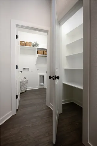 a view of entryway with wooden floor