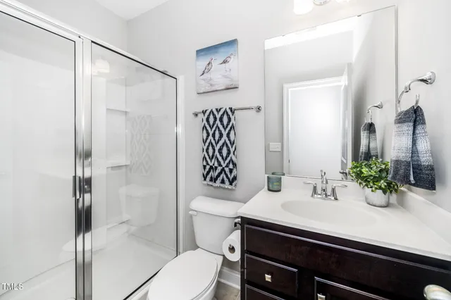 a view of livingroom with furniture and a fireplace