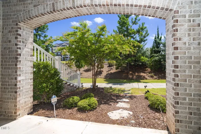 a bathroom with a sink a toilet a shower and a mirror
