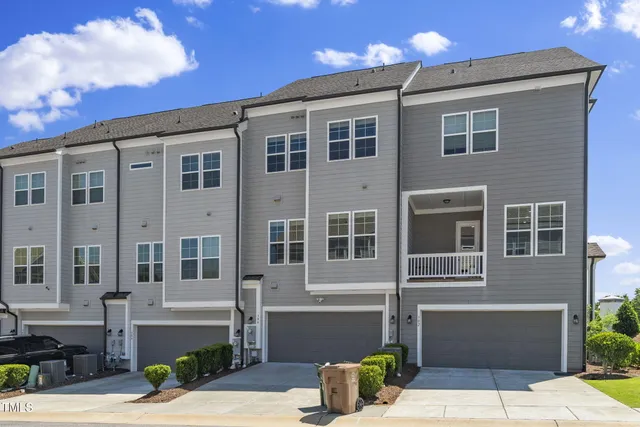 a front view of a house with outdoor space