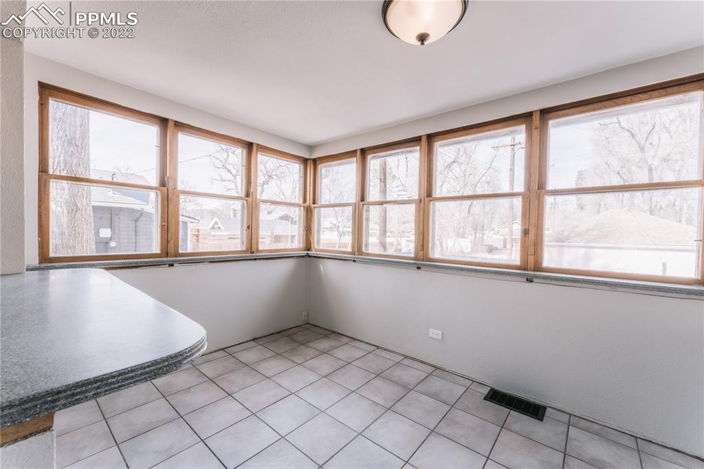1018 East Boulder Street Colorado Springs, CO 80903 - Photo 14 of 40 a view of an empty room with a window