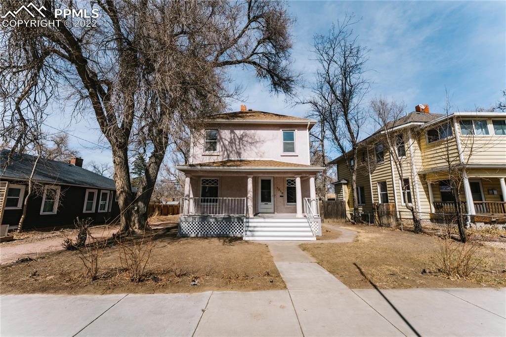1018 East Boulder Street Colorado Springs, CO 80903 - Photo 2 of 40 a front view of a building with street