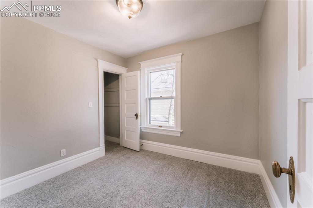 1018 East Boulder Street Colorado Springs, CO 80903 - Photo 22 of 40 a view of an empty room with a window