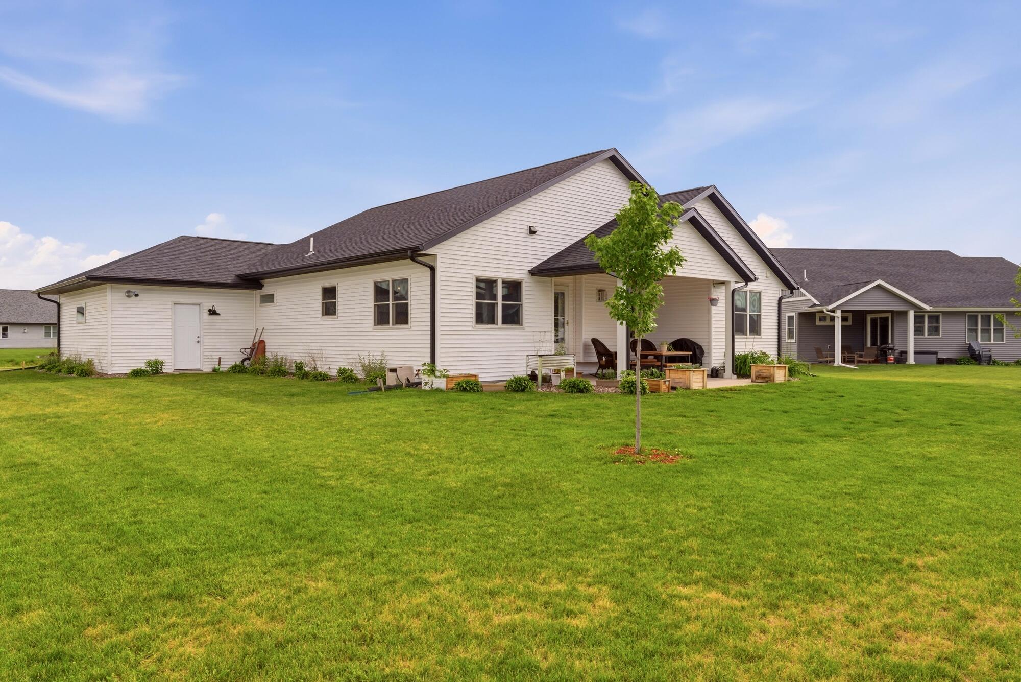 1709 Killdeer Street Holmen, WI 54636 - Photo 22 of 26 Back of home w/ covered patio