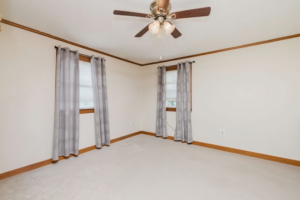 20 Wilcox Street Fall River, MA 02724 - Photo 23 of 28 a view of a room with a ceiling fan and window