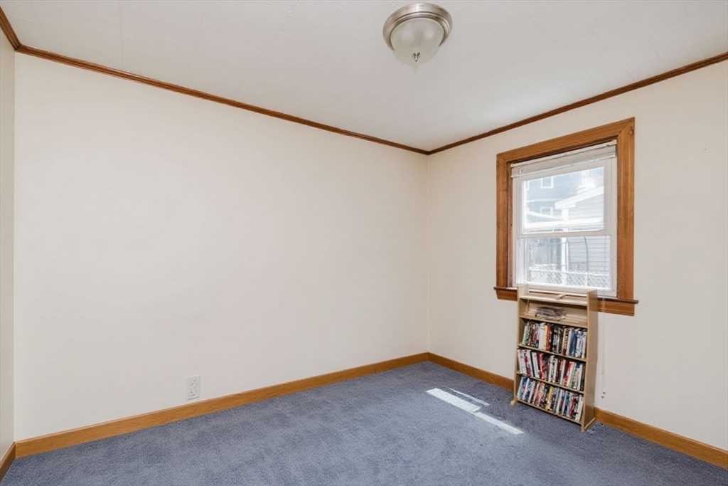 20 Wilcox Street Fall River, MA 02724 - Photo 24 of 28 a view of an empty room with a window