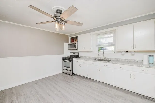 a bathroom with a toilet sink