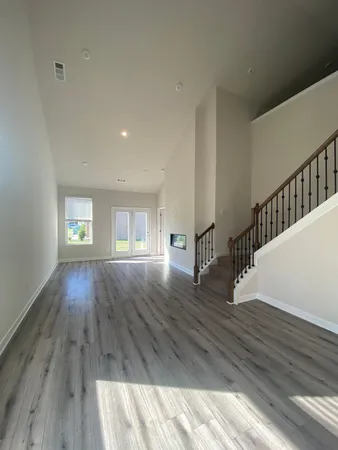 a view of entryway with wooden floor