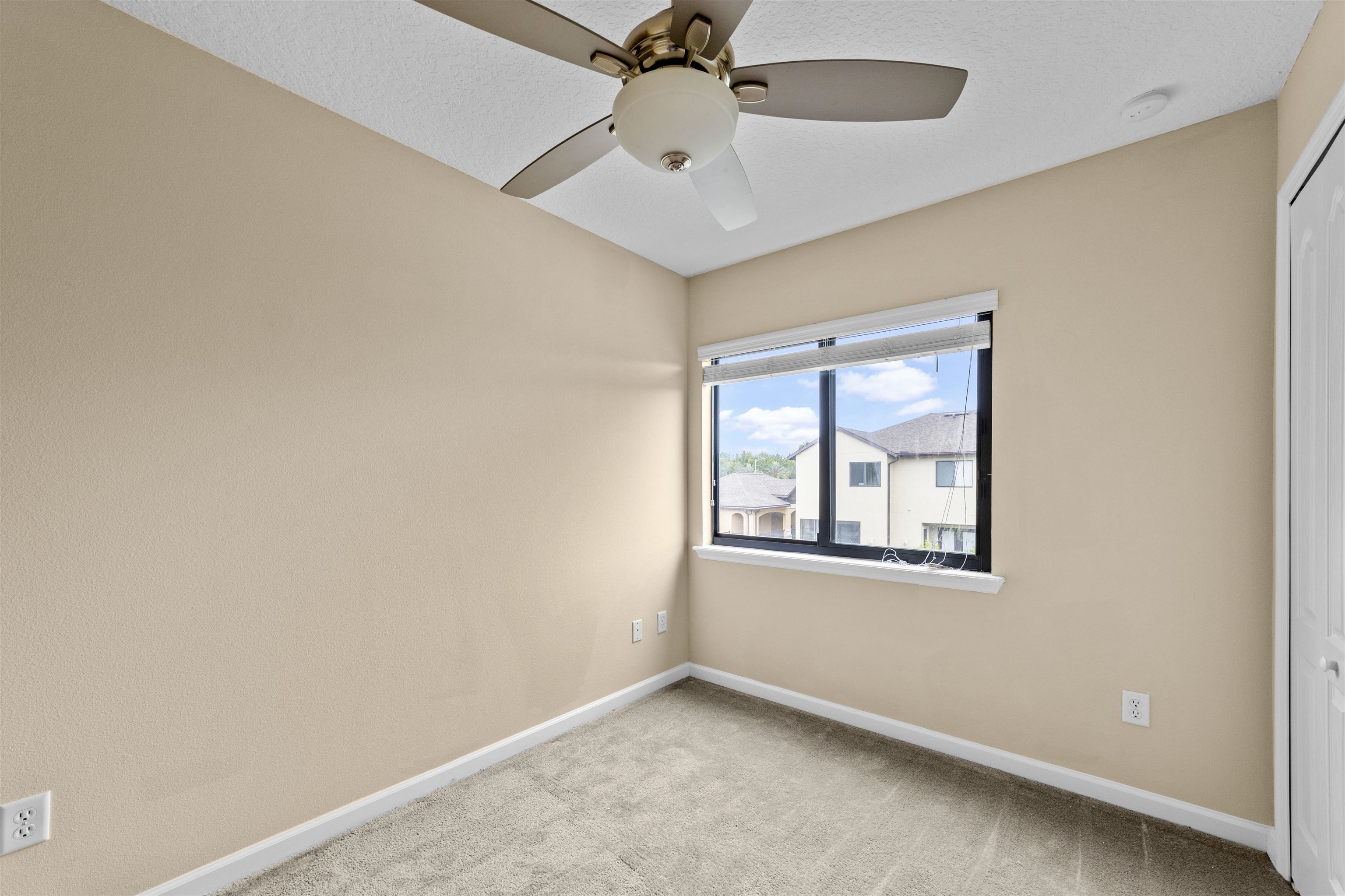 652 Drake Bay Terrace St. Augustine, FL 32084 - Photo 22 of 30 an empty room with a window and a fan