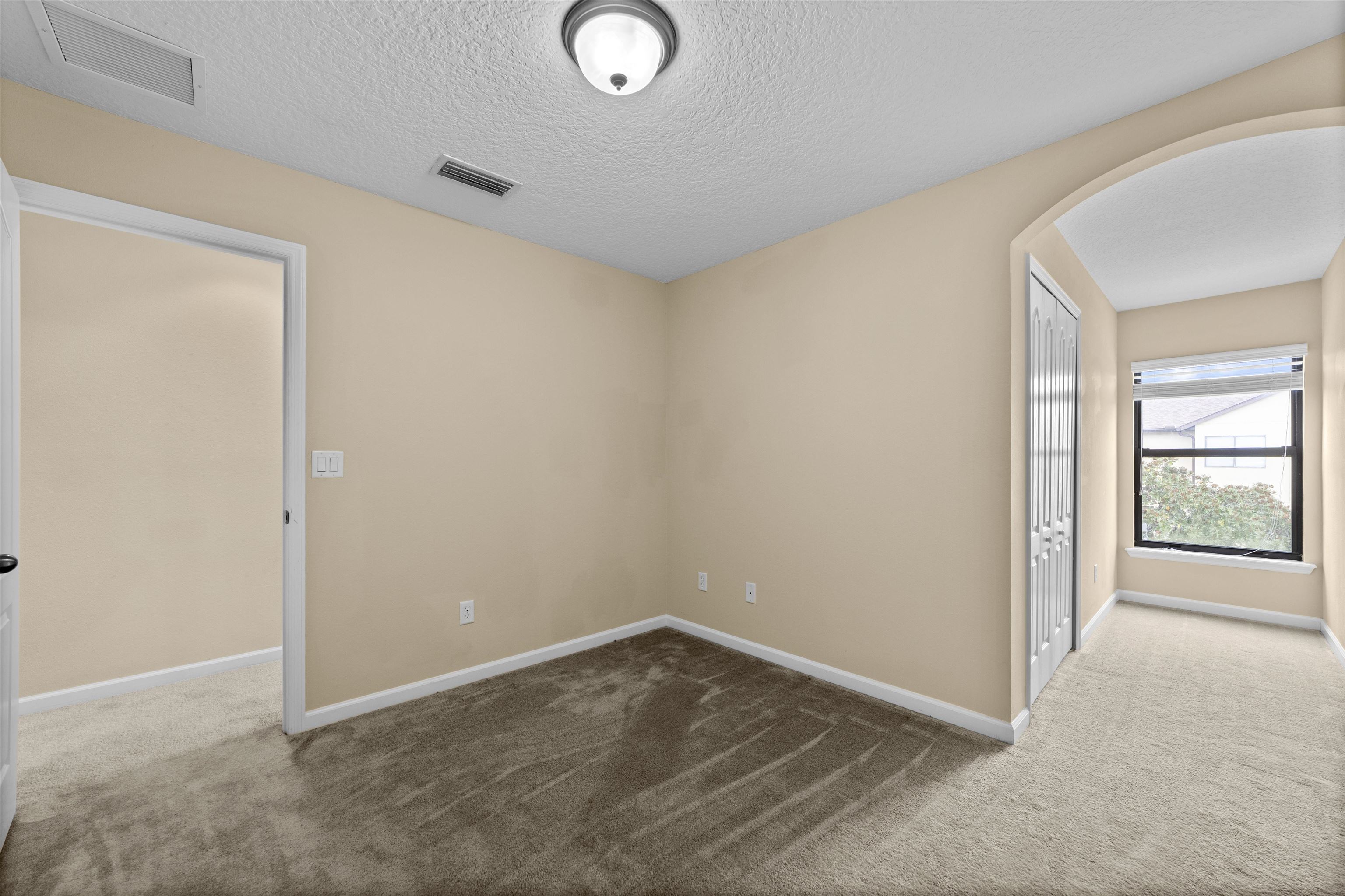 652 Drake Bay Terrace St. Augustine, FL 32084 - Photo 27 of 30 an empty room with windows