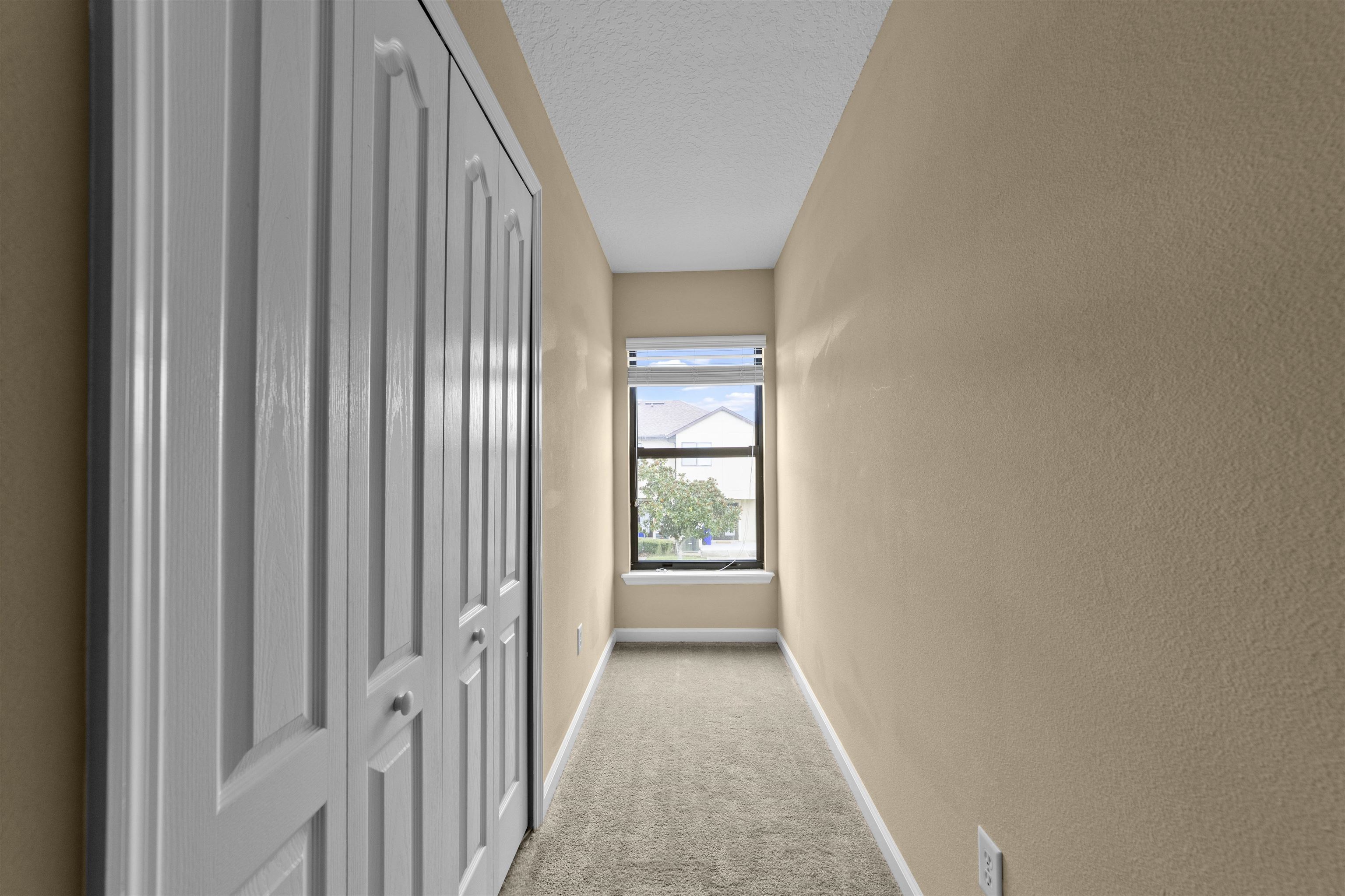 652 Drake Bay Terrace St. Augustine, FL 32084 - Photo 28 of 30 a view of a hallway with windows