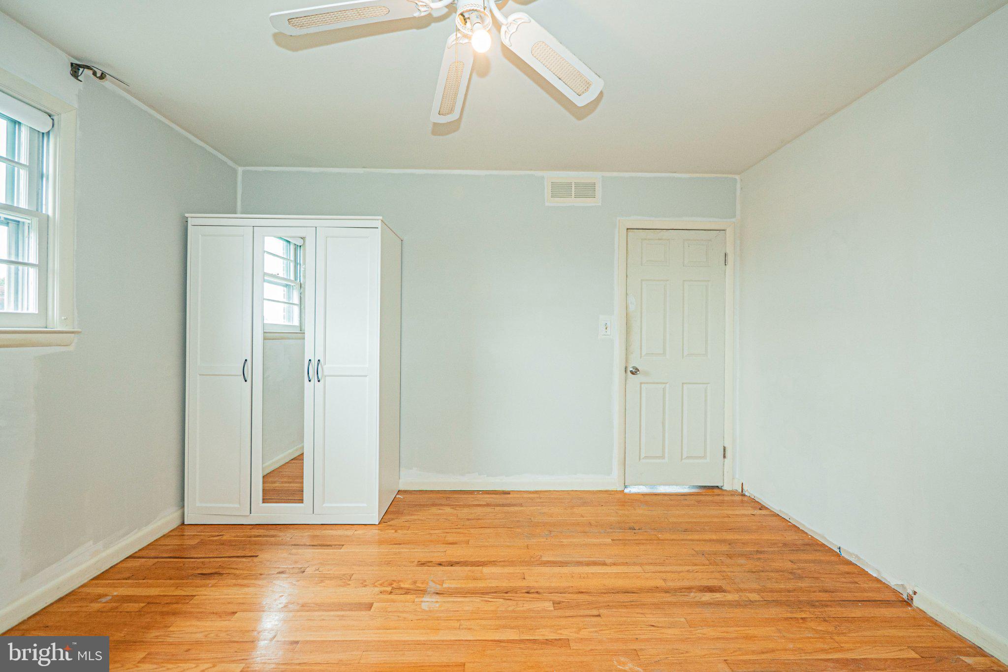 9907 Forge Park Road Perry Hall, MD 21128 - Photo 22 of 36 Bright and airy room with hardwood floors.