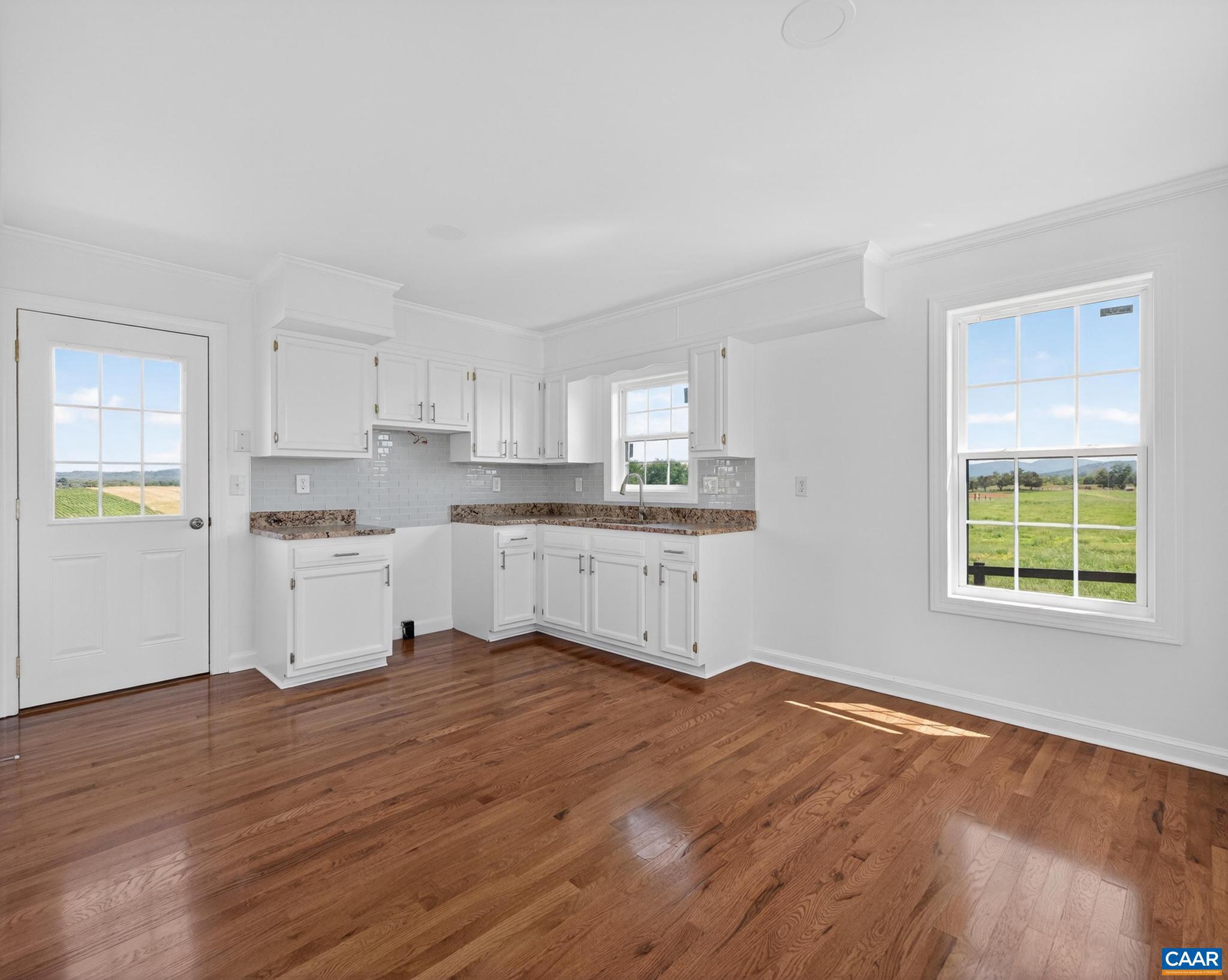 481 Race Ground Road Somerset, VA 22972 - Photo 42 of 53 a view of a kitchen with wooden floor and electronic appliances