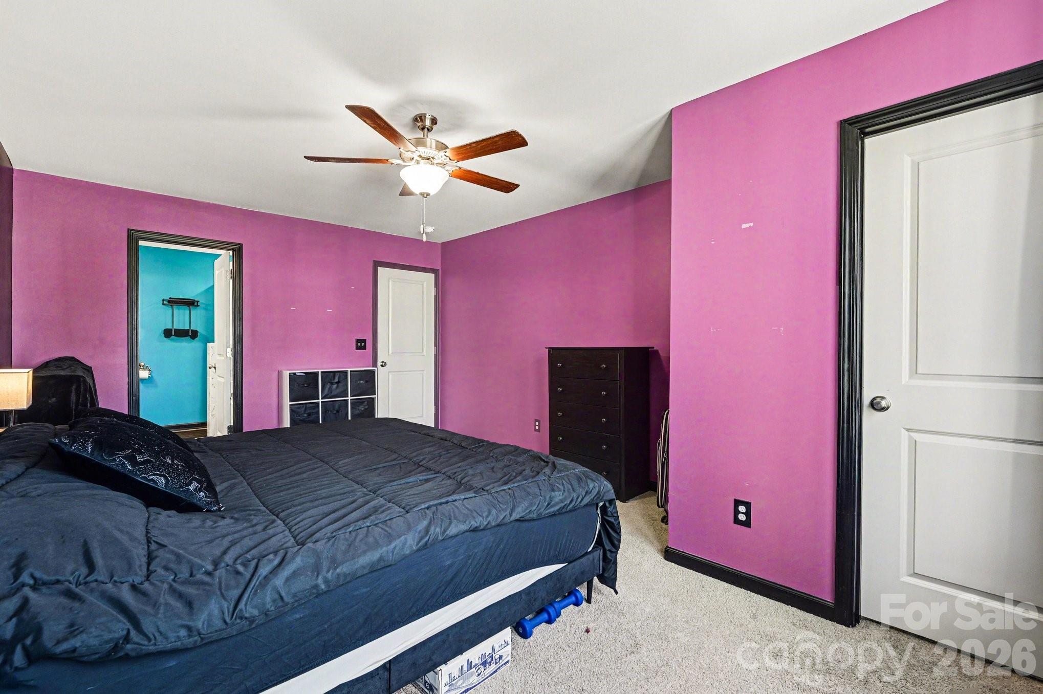 313 Bell Street Mount Holly, NC 28120 - Photo 11 of 19 a bedroom with a bed and a dresser