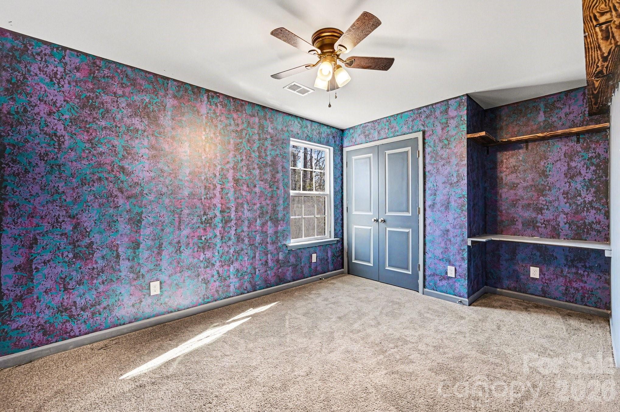 313 Bell Street Mount Holly, NC 28120 - Photo 14 of 19 a view of an empty room with a window