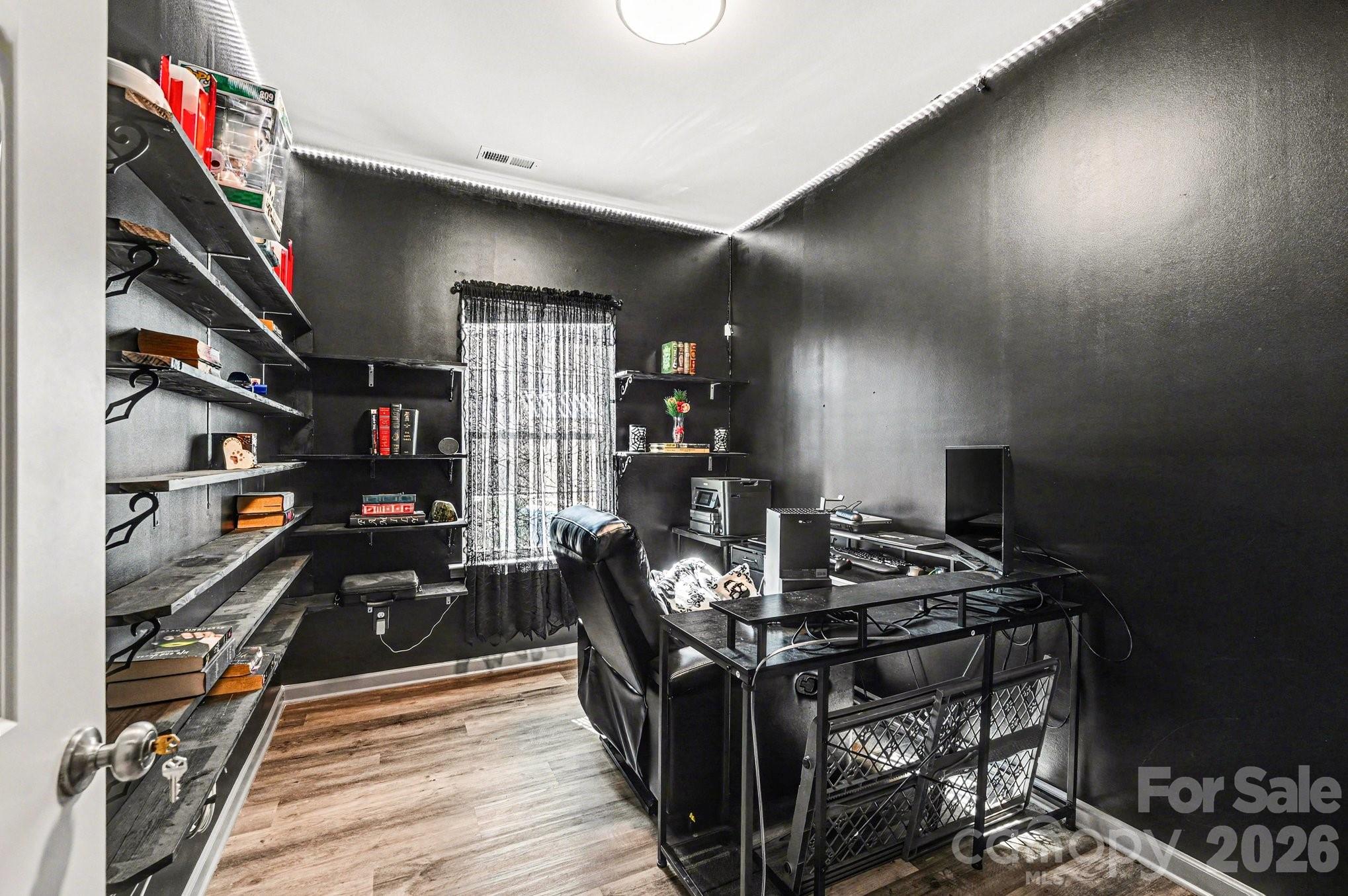 313 Bell Street Mount Holly, NC 28120 - Photo 10 of 19 a view of a room with gym equipment