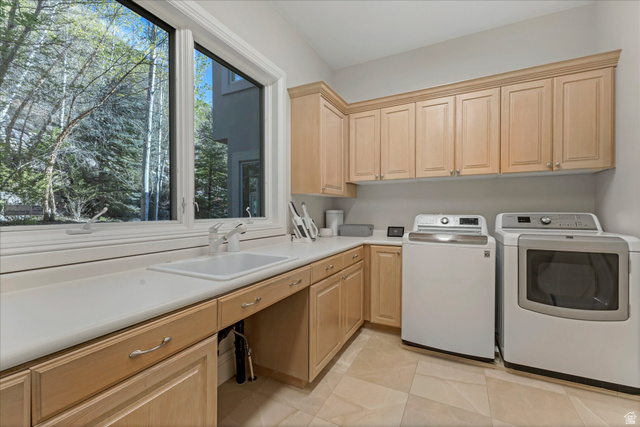 3222 Eagle View Circle Sandy, UT 84092 - Photo 31 of 60 Laundry area with washing machine and clothes dryer and cabinet space
