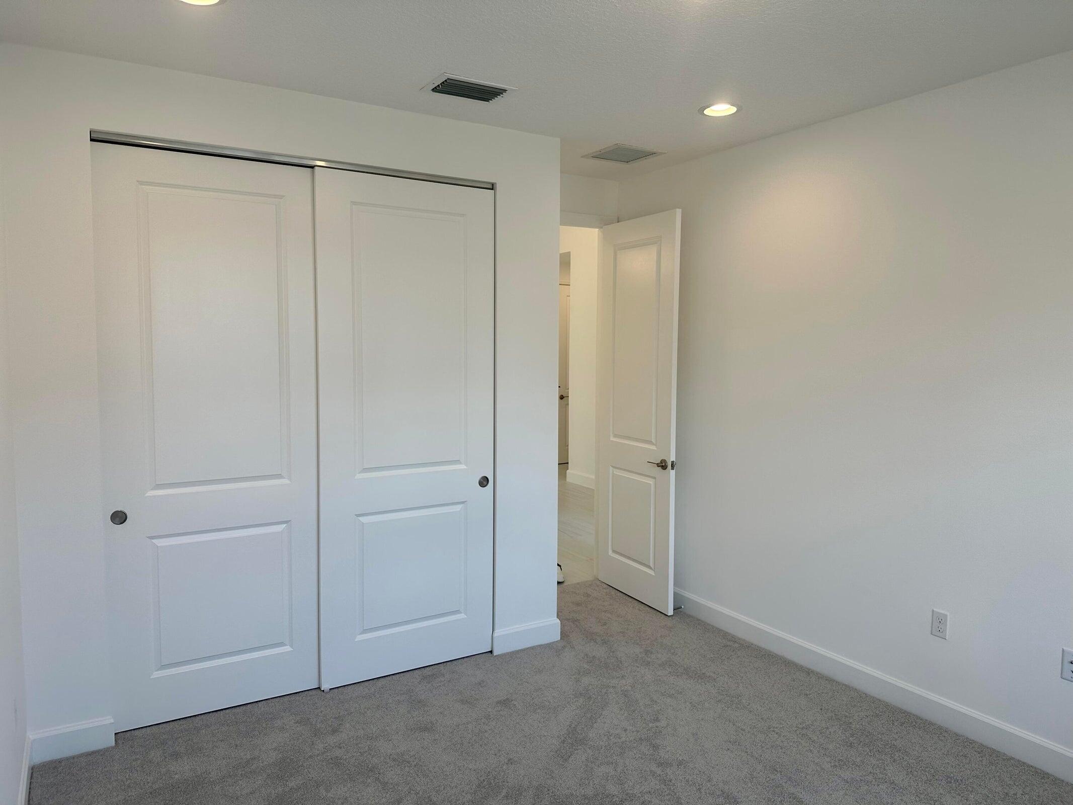 1346 Harvester Crossing Loxahatchee, FL 33470 - Photo 28 of 43 a view of an empty room