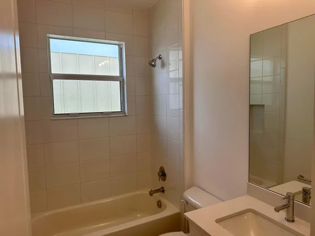 a bathroom with a sink and a bathtub