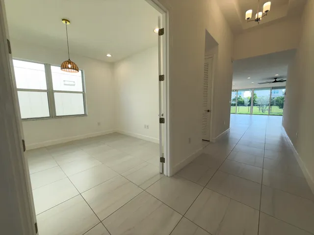 a view of an empty room and window