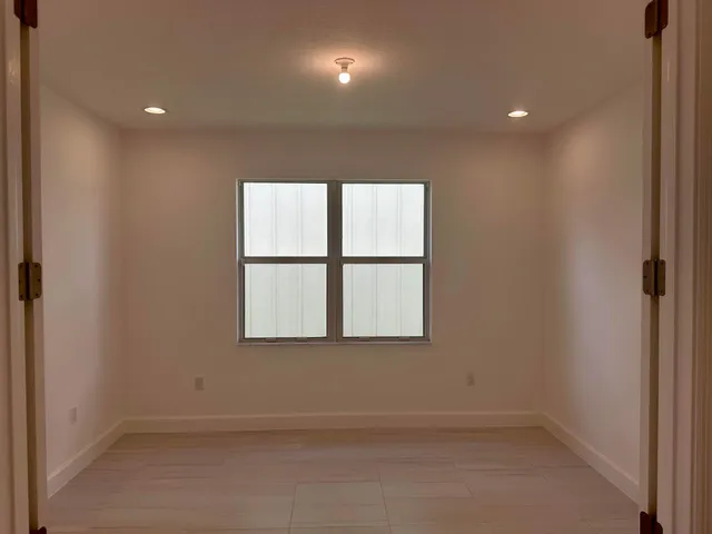 an empty room with a window