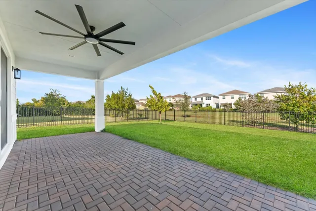 a view of a porch and garden