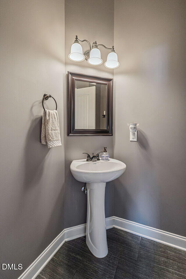 136 Kenneth Lane Willow Spring, NC 27592 - Photo 31 of 94 Half bath on main level