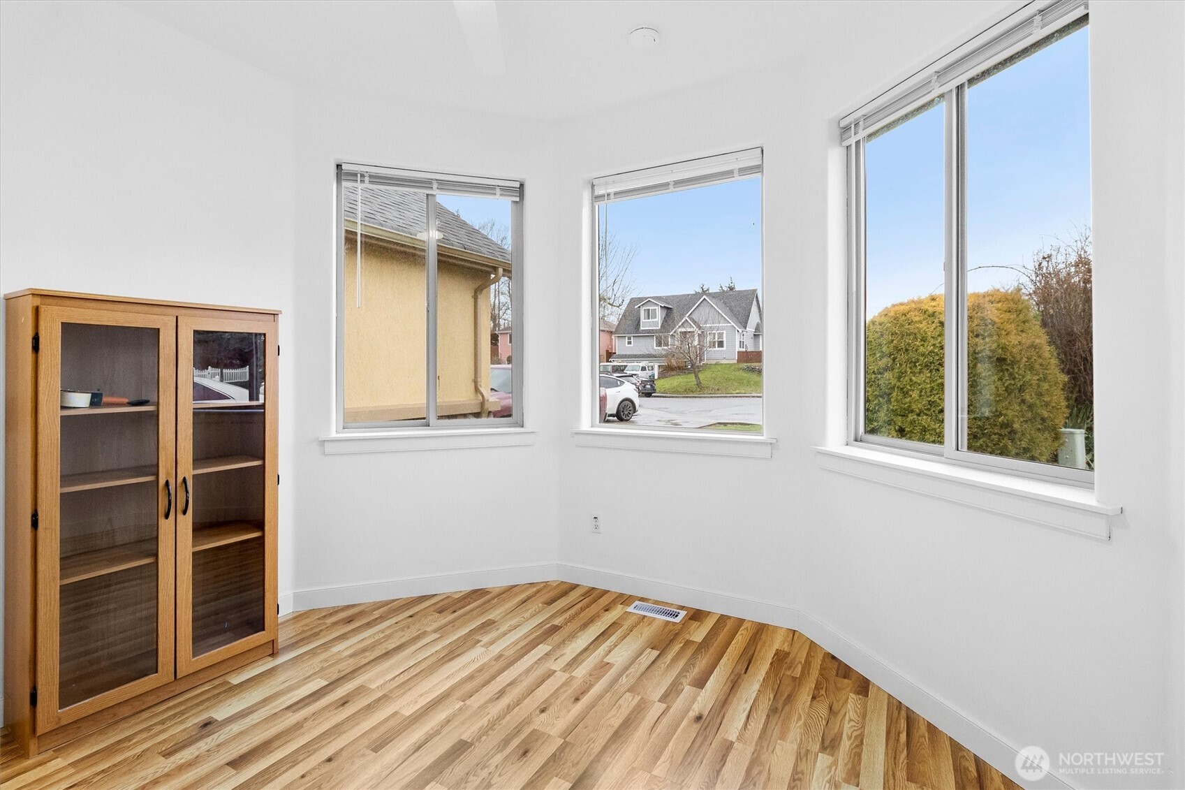 4169 Dover Street Bellingham, WA 98226 - Photo 14 of 31 a view of empty room with wooden floor and fan