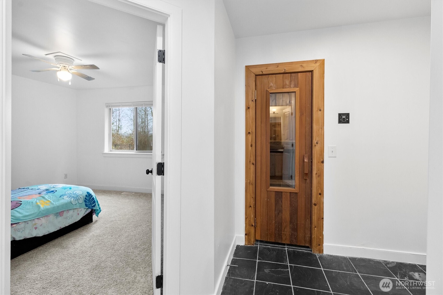 4169 Dover Street Bellingham, WA 98226 - Photo 19 of 31 a view of a room that has a bed in it
