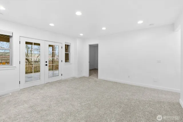 a view of a room with sliding glass door