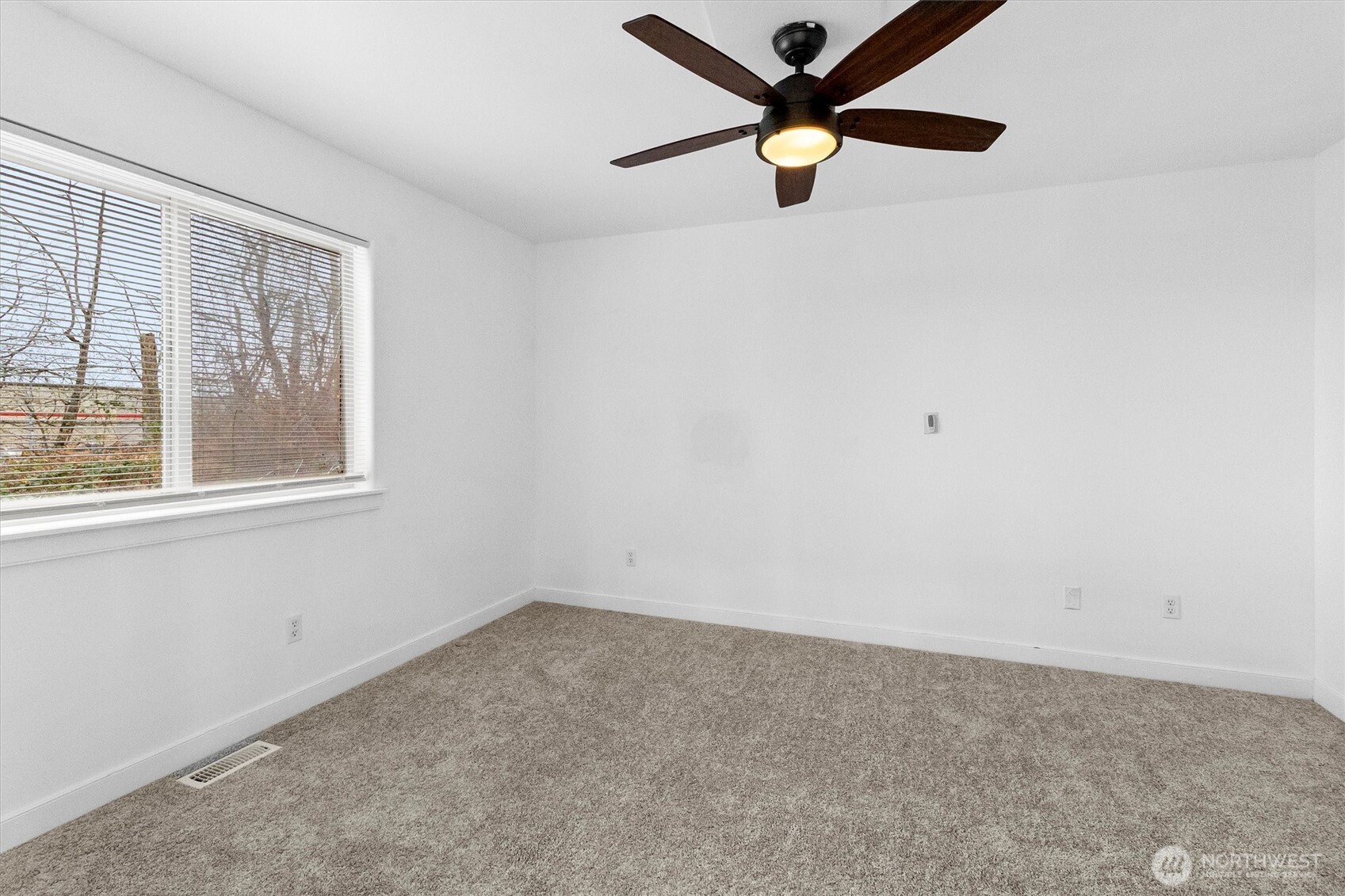 4169 Dover Street Bellingham, WA 98226 - Photo 29 of 31 an empty room with a window and a fan