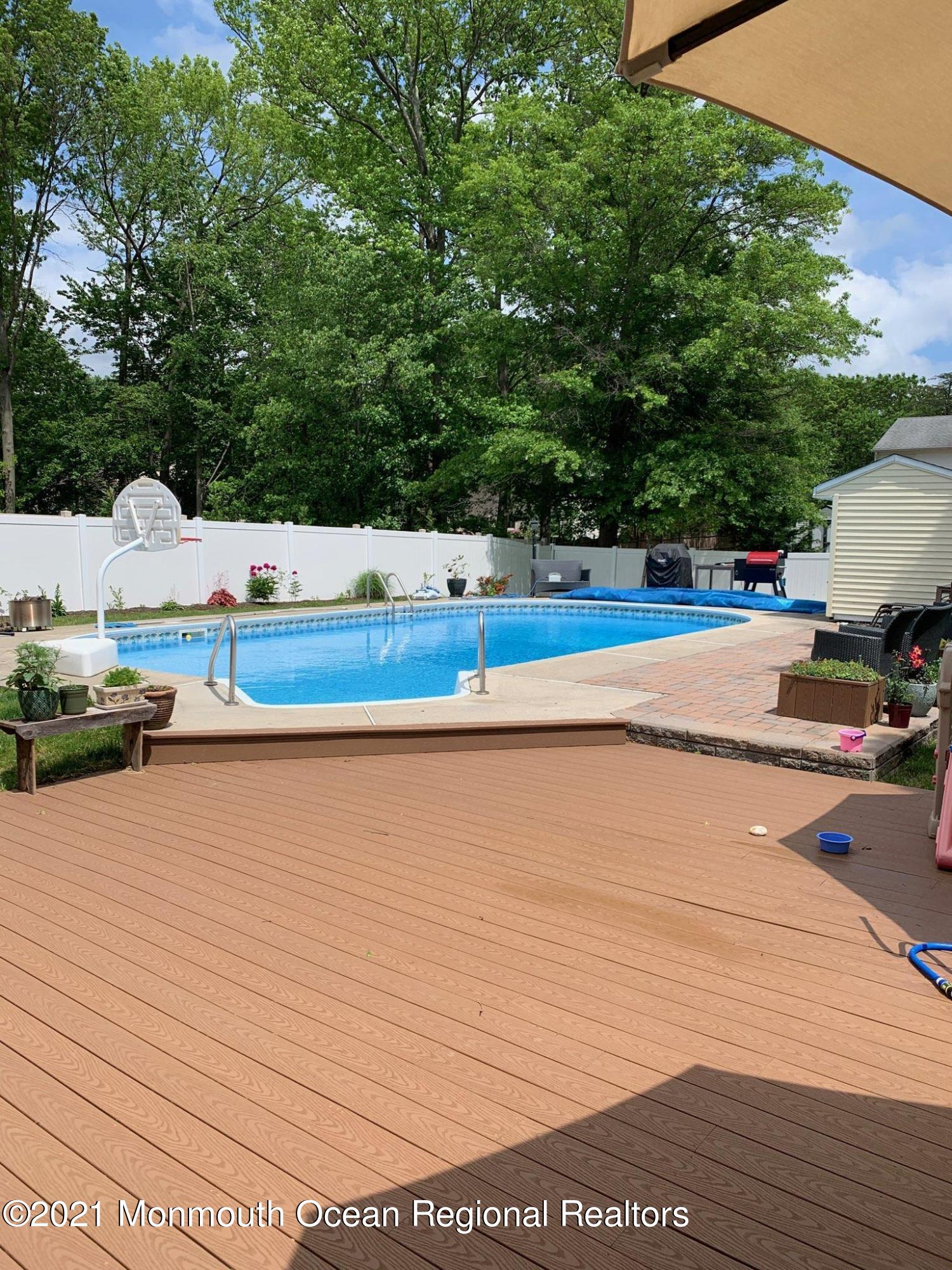 19 Regal Road Manalapan, NJ 07726 - Photo 26 of 33 Trex Patio Deck