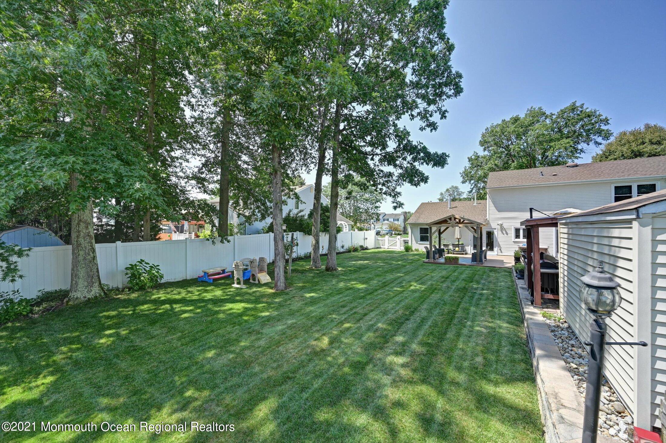 19 Regal Road Manalapan, NJ 07726 - Photo 30 of 33 Backyard, Grass Area