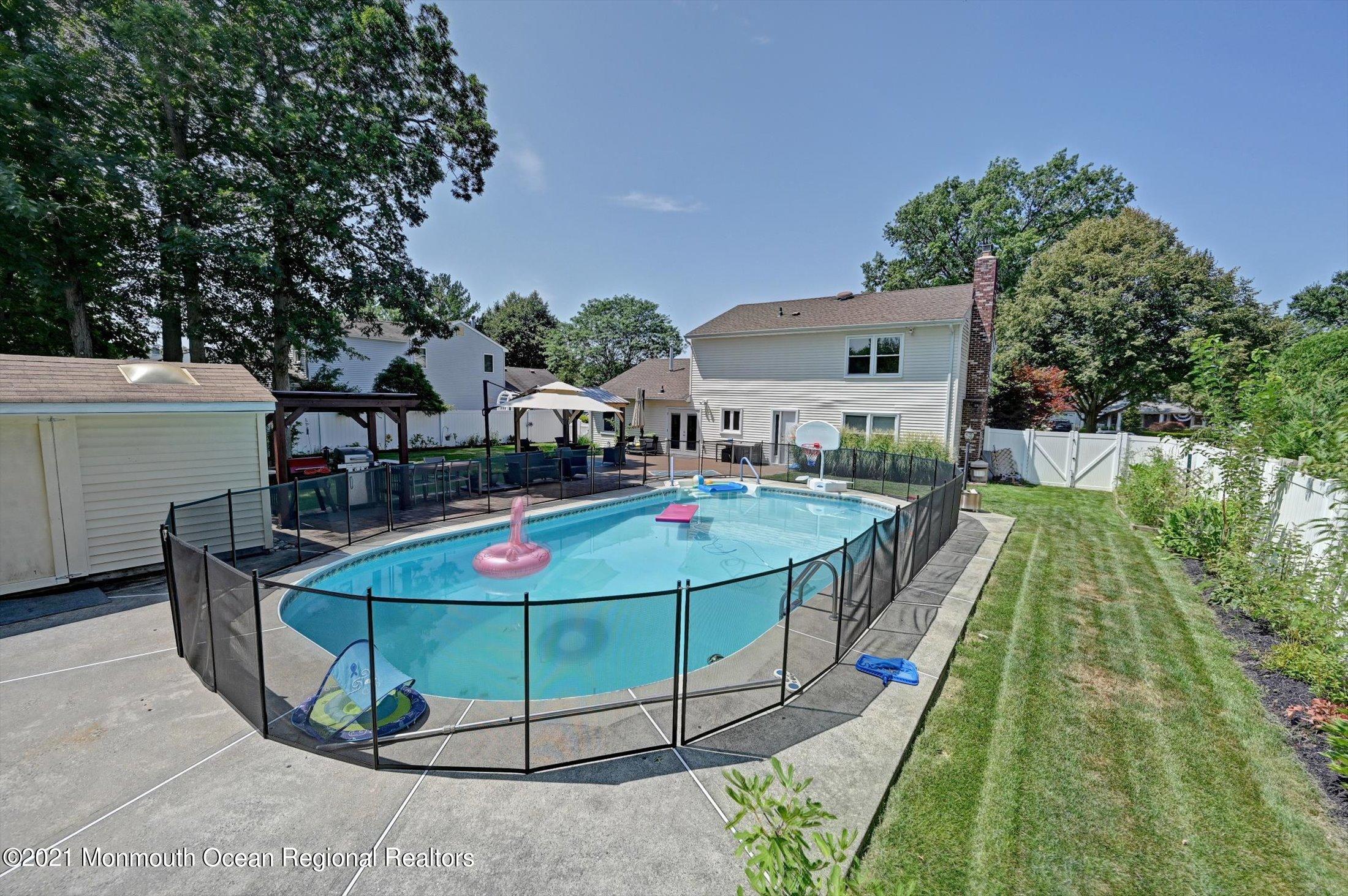 19 Regal Road Manalapan, NJ 07726 - Photo 31 of 33 Fenced Inground Pool