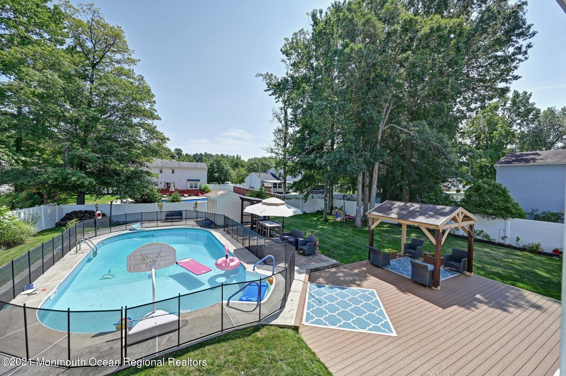 19 Regal Road Manalapan, NJ 07726 - Photo 32 of 33 Inground Pool