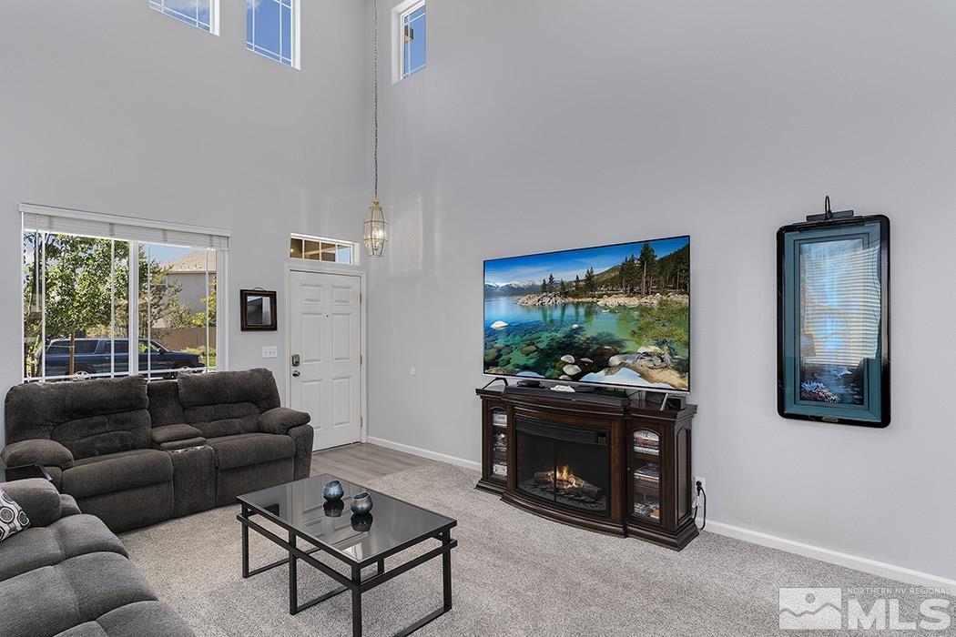 2267 Big Trail Circle Reno, NV 89521 - Photo 12 of 37 a living room with furniture and a fireplace