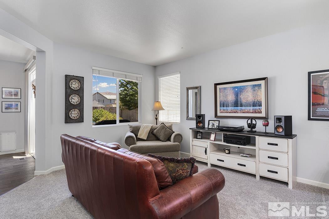 2267 Big Trail Circle Reno, NV 89521 - Photo 16 of 37 a living room with furniture and painting on the wall