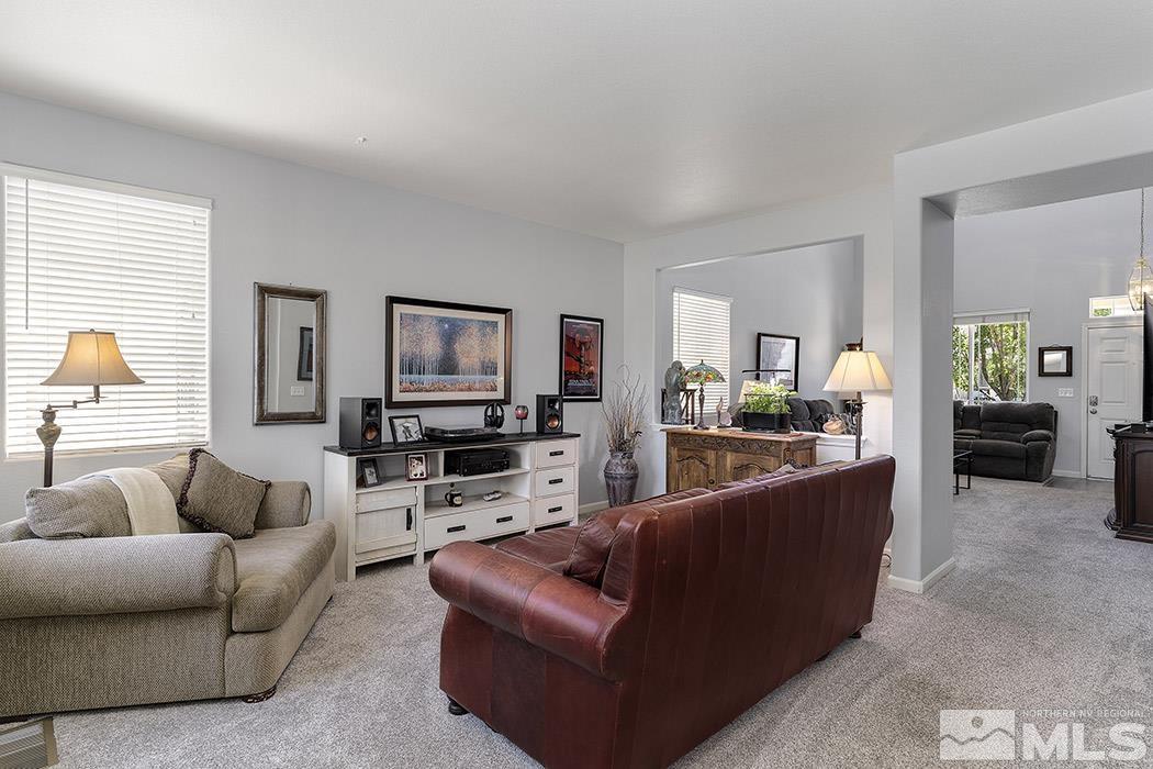 2267 Big Trail Circle Reno, NV 89521 - Photo 17 of 37 a living room with furniture and a wooden floor