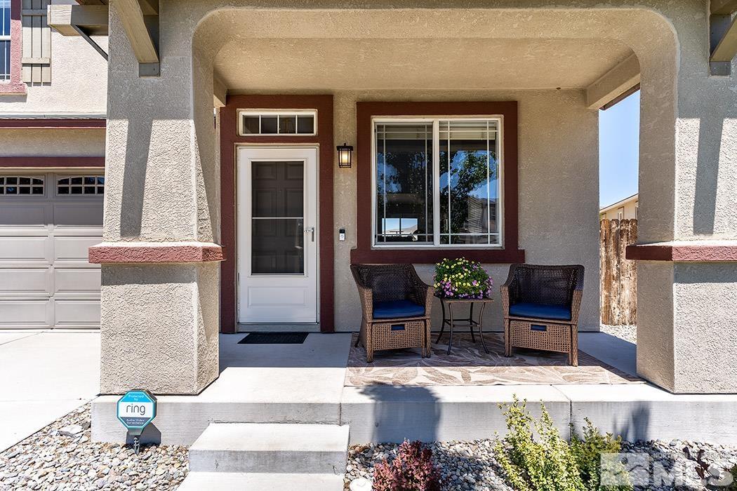 2267 Big Trail Circle Reno, NV 89521 - Photo 2 of 37 a front view of a building with outdoor seating