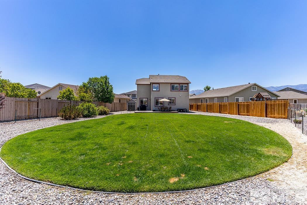 2267 Big Trail Circle Reno, NV 89521 - Photo 7 of 37 a front view of a house with garden