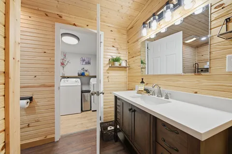 a bathroom with a sink and a mirror