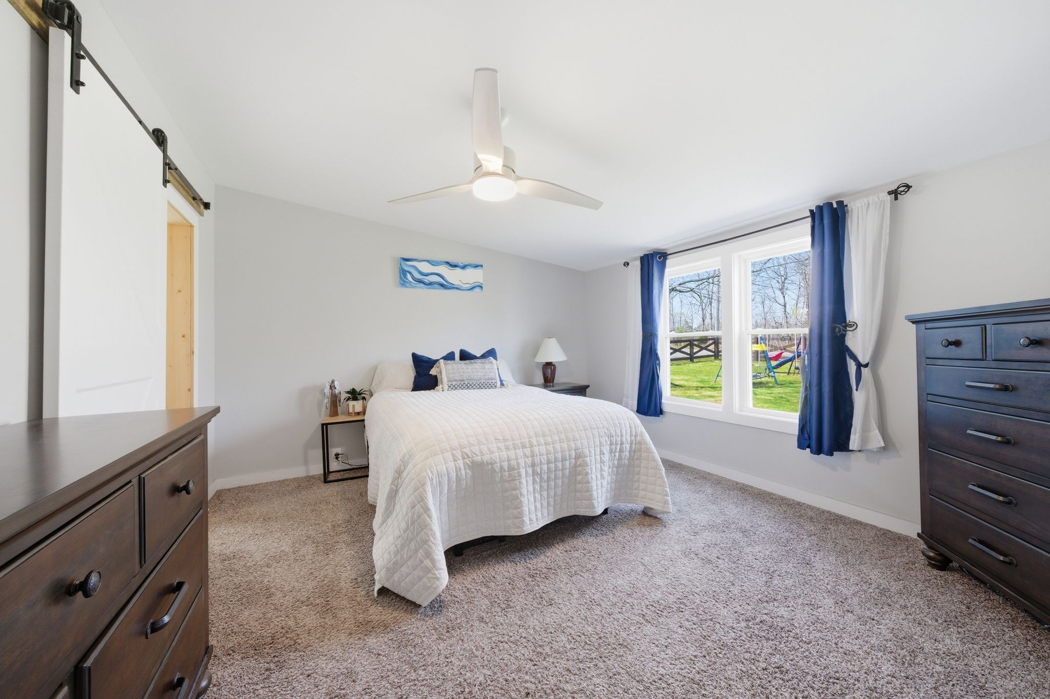 1225 Eno Road Dickson, TN 37055 - Photo 15 of 25 a spacious bedroom with a bed and a window