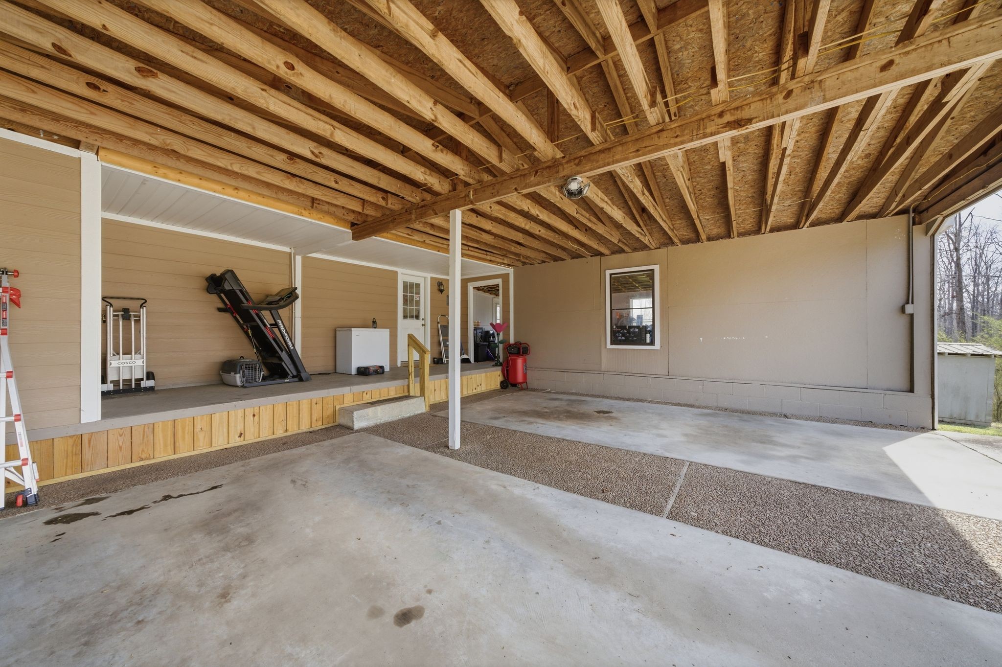 1225 Eno Road Dickson, TN 37055 - Photo 20 of 25 a view of a room with gym equipment