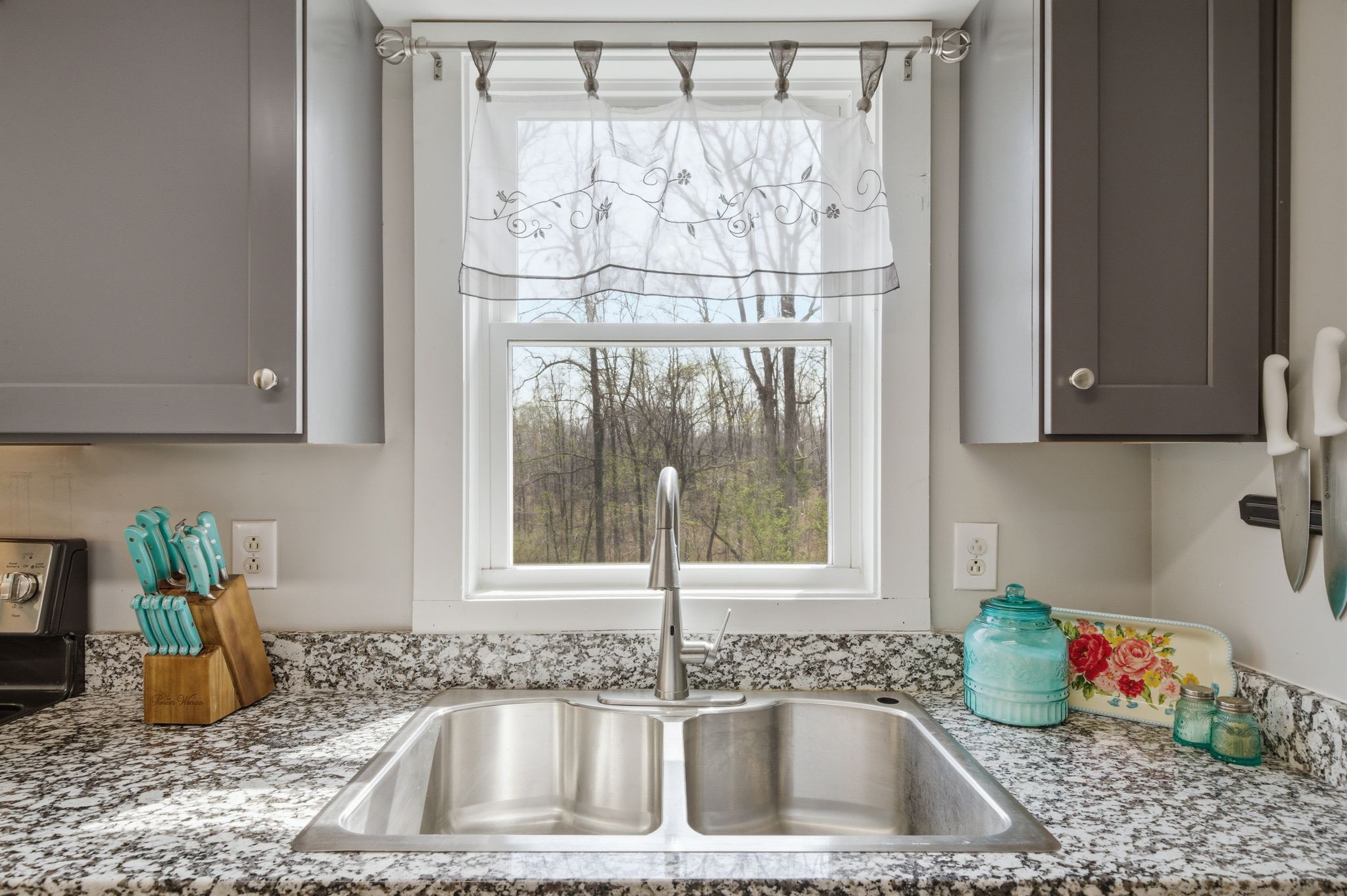1225 Eno Road Dickson, TN 37055 - Photo 10 of 25 a kitchen with a sink and a window