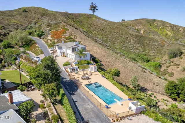 a view of a city with mountains in the background