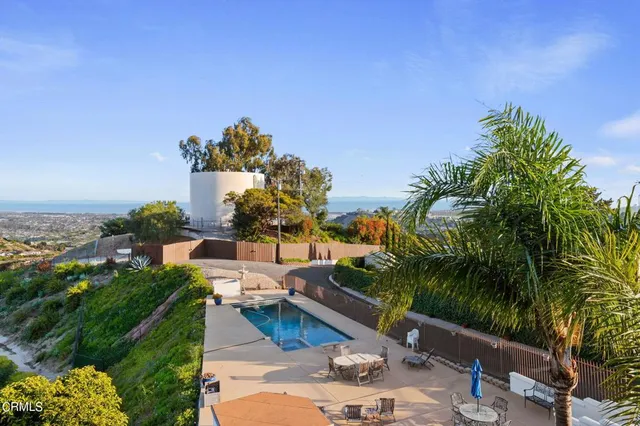 a view of a houses with a yard