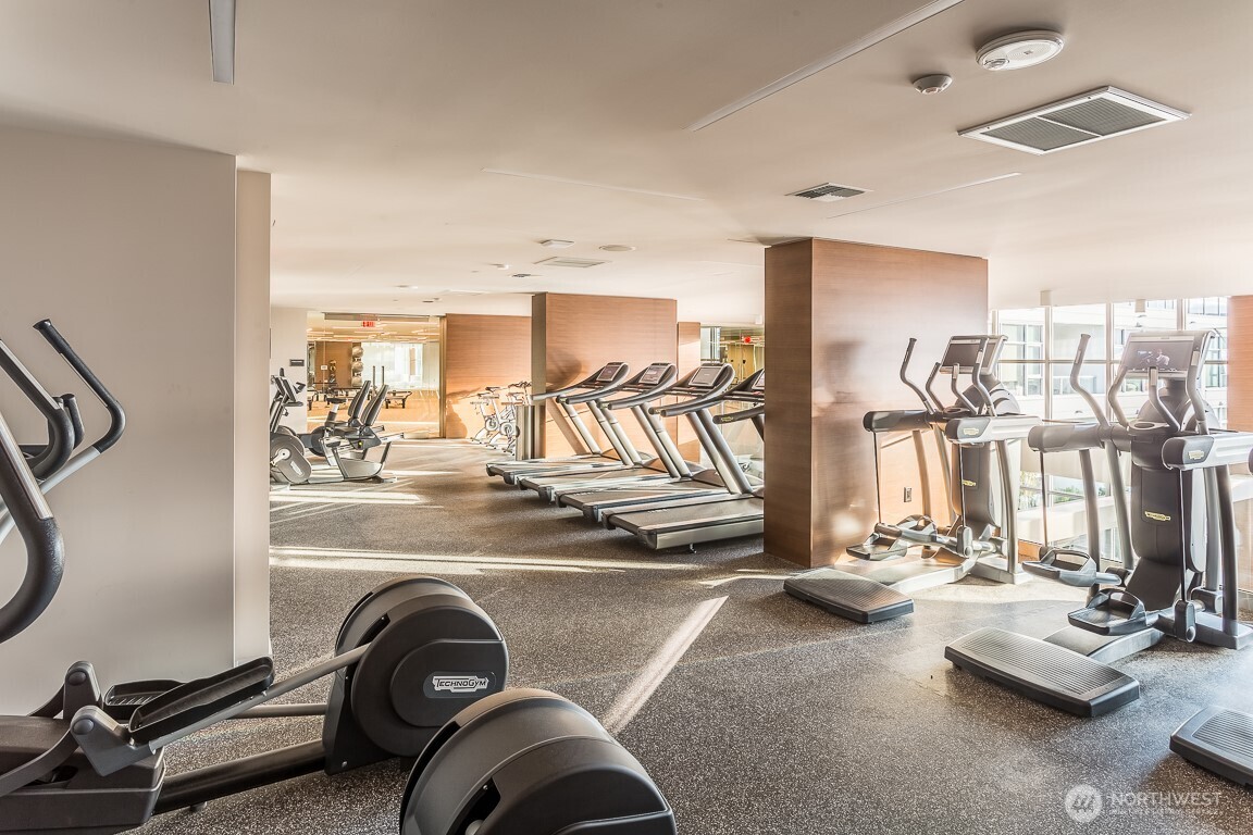 583 Battery Street, Unit 1405N Seattle, WA 98121 - Photo 23 of 37 a view of a room with gym equipment