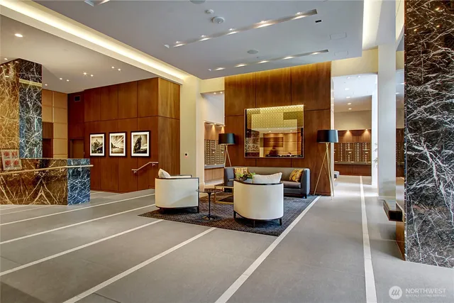 a lobby with furniture and window