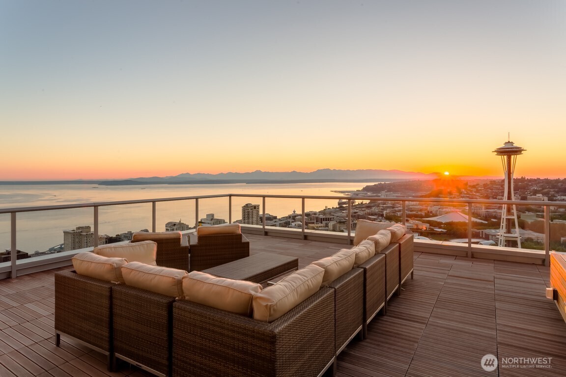 583 Battery Street, Unit 1405N Seattle, WA 98121 - Photo 32 of 37 a balcony with furniture and city view